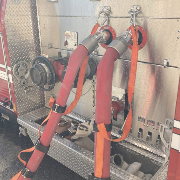 High Pressure Hose Tether attached to Firetruck Pump Panel