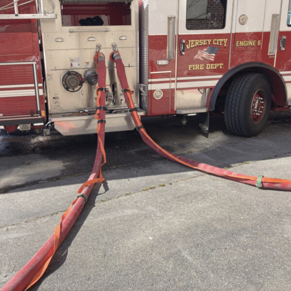 High Pressure Hose Tether attached to Firetruck Pump Panel